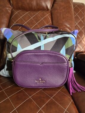 Kate Spade purple pebble leather crossbody with tassel